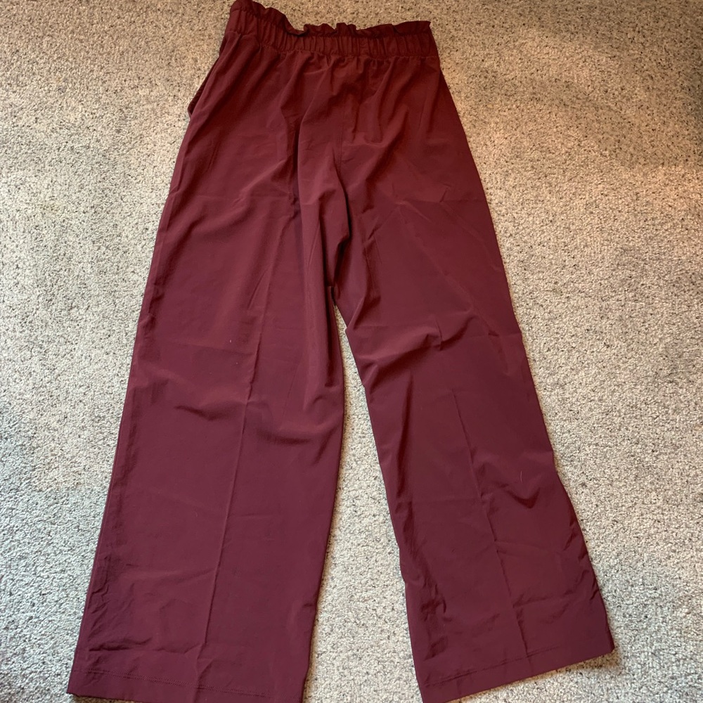 athletic wear material, loose fitting. Plum color